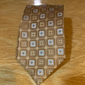 Elegant Geometric Patterned Tie in Brown and Blue